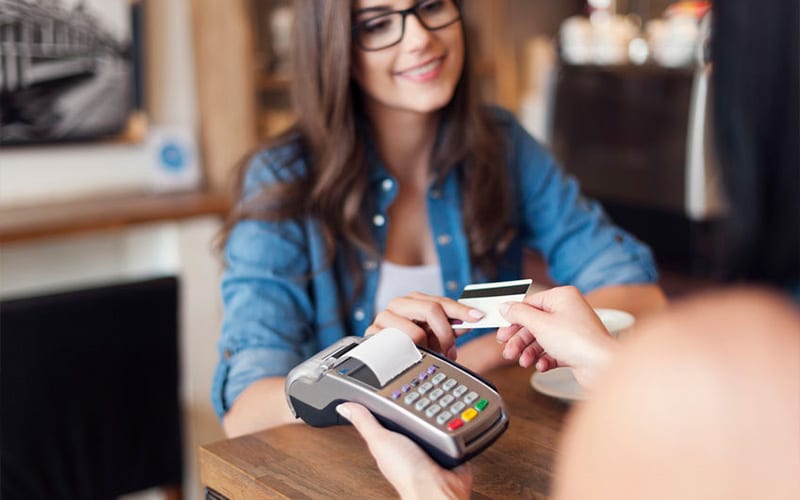 Retail Transaction, Woman, Credit Card Terminal